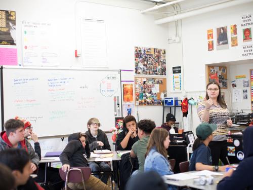 Female teacher leads a classroom